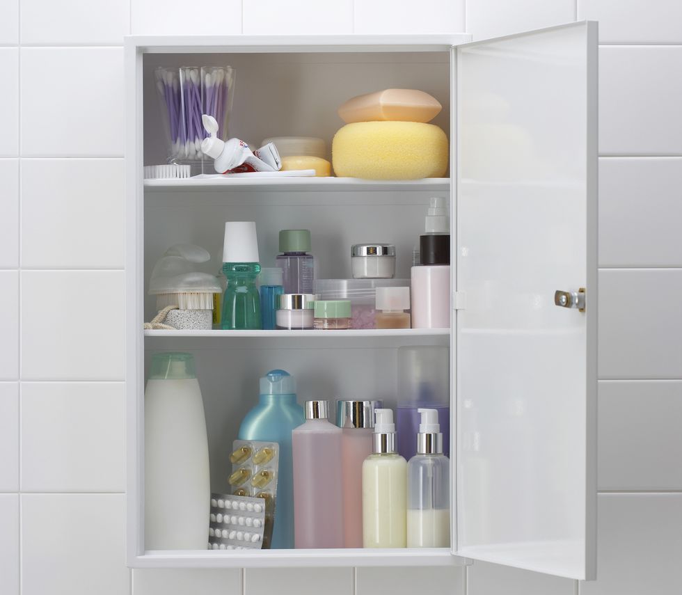 01-various-cosmetics-and-bath-products-in-bathroom-cabinet