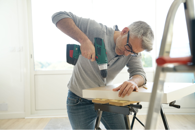 man-doing-construction-work-drill
