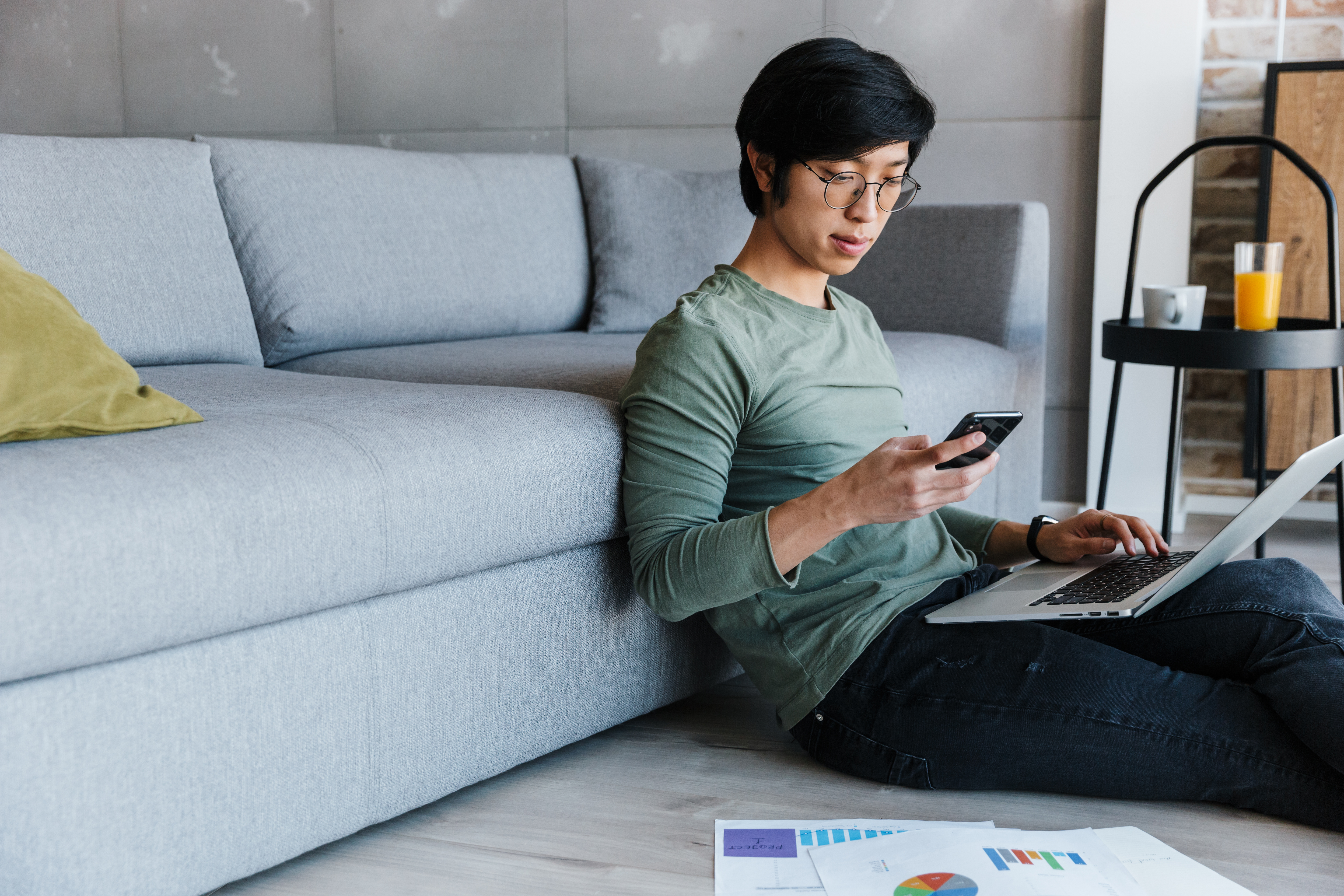image-serious-asian-man-eyeglasses-working