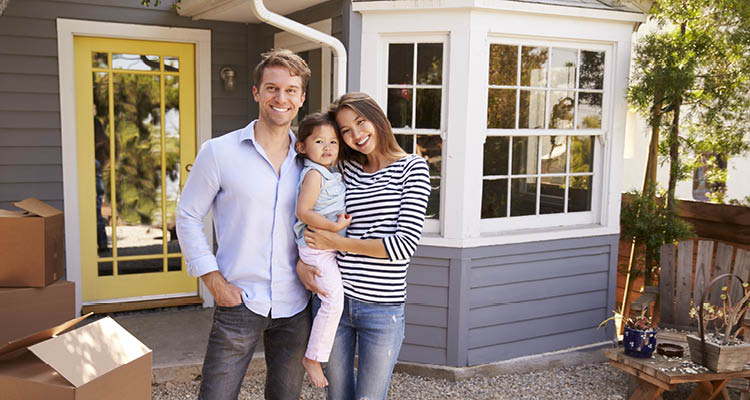 01-family-outside-home-yellow-front-door